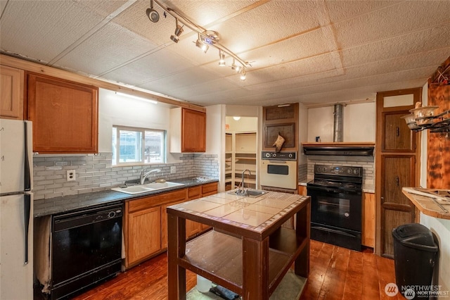 7503 189th Street Ct E Unit 12, Puyallup, WA 98375 - kitchen with black appliances, dark wood-type flooring, tile counters, decorative backsplash, and open shelves