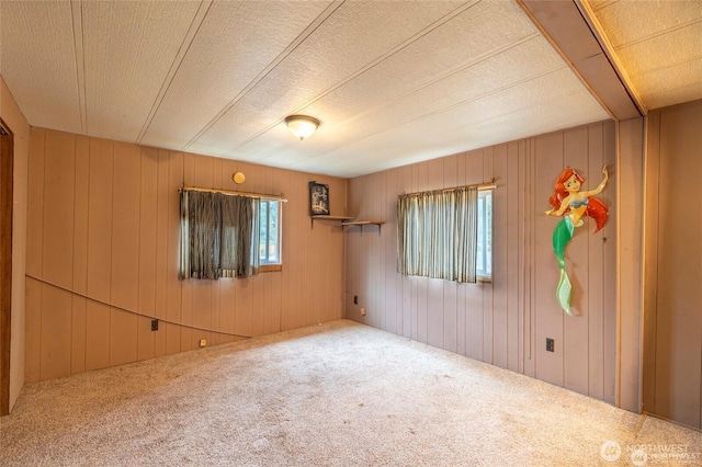 7503 189th Street Ct E Unit 12, Puyallup, WA 98375 - carpeted spare room featuring wooden walls