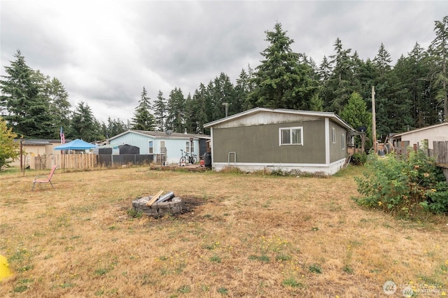 7503 189th Street Ct E Unit 12, Puyallup, WA 98375 - back of property with an outdoor fire pit