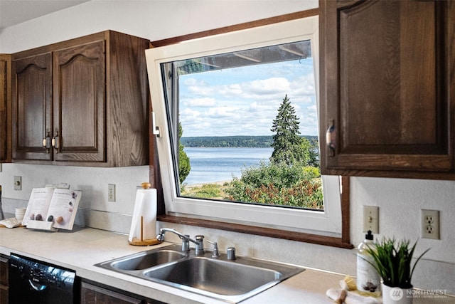 10601 87th Ct, Anderson Island, WA 98303 - kitchen featuring dishwasher, dark brown cabinetry, and light countertops