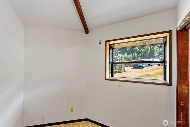 10601 87th Ct, Anderson Island, WA 98303 - spare room with beamed ceiling and baseboards