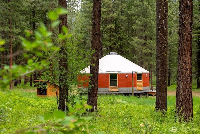 39 Ulrich Ln, Mazama, WA 98833 - view of front facade with a forest view