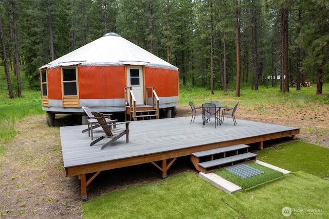39 Ulrich Ln, Mazama, WA 98833 - wooden terrace with a view of trees and outdoor dining space