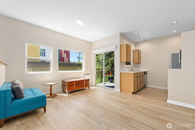 4530 Meridian Ave N Unit S4, Seattle, WA 98103 - sitting room with light wood-style floors and recessed lighting