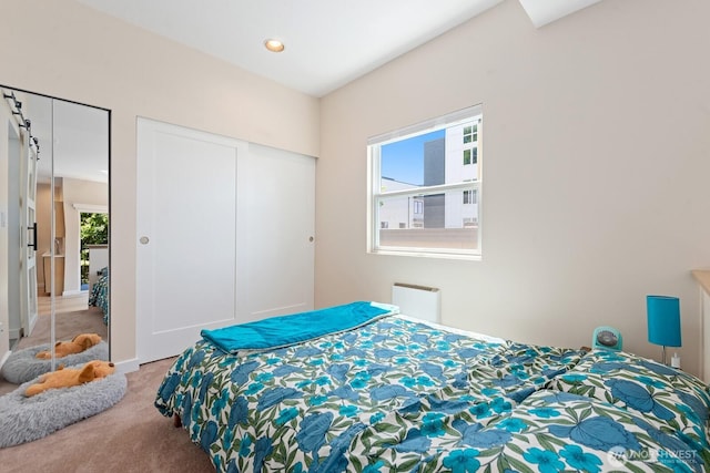 4530 Meridian Ave N Unit S4, Seattle, WA 98103 - bedroom with carpet floors, radiator heating unit, and a closet