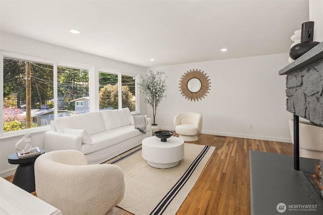 1136 N 146th Pl, Shoreline, WA 98133 - living area featuring wood finished floors, recessed lighting, and baseboards