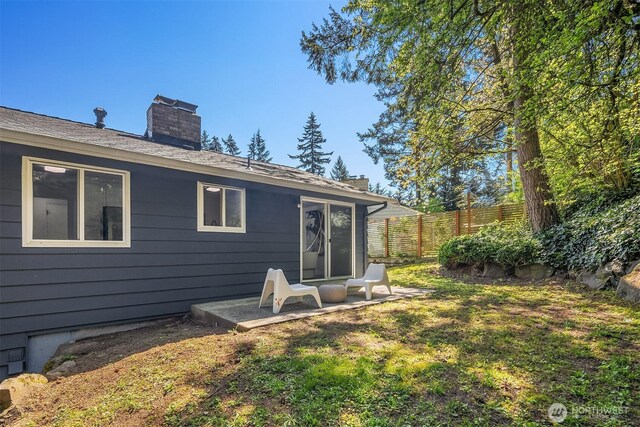1136 N 146th Pl, Shoreline, WA 98133 - rear view of house featuring a chimney