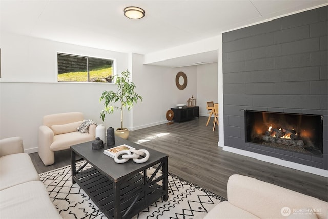 1136 N 146th Pl, Shoreline, WA 98133 - living room with wood finished floors, baseboards, and a fireplace