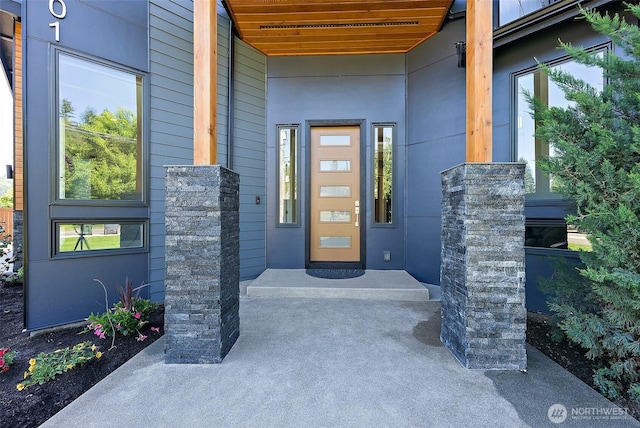 10501 Angeline Rd E, Bonney Lake, WA 98391 - property entrance with a porch and stone siding