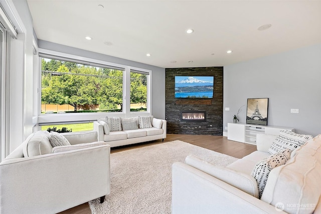 10501 Angeline Rd E, Bonney Lake, WA 98391 - living room with a fireplace, wood finished floors, healthy amount of natural light, and recessed lighting