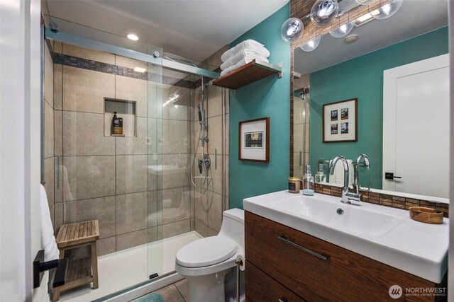 7008 155th Pl NE, Redmond, WA 98052 - full bath featuring vanity, a shower stall, and tile patterned flooring