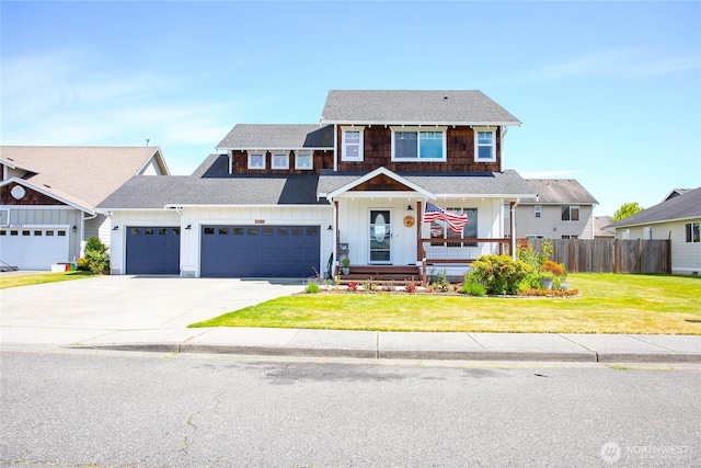 7328 Seashell Way, Blaine, WA 98230 - view of front of house with board and batten siding, a garage, driveway, roof with shingles, and a porch