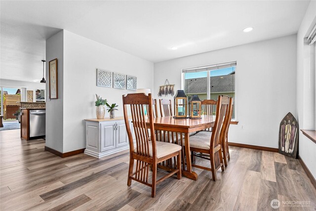 7328 Seashell Way, Blaine, WA 98230 - dining space featuring healthy amount of natural light, wood finished floors, baseboards, and recessed lighting