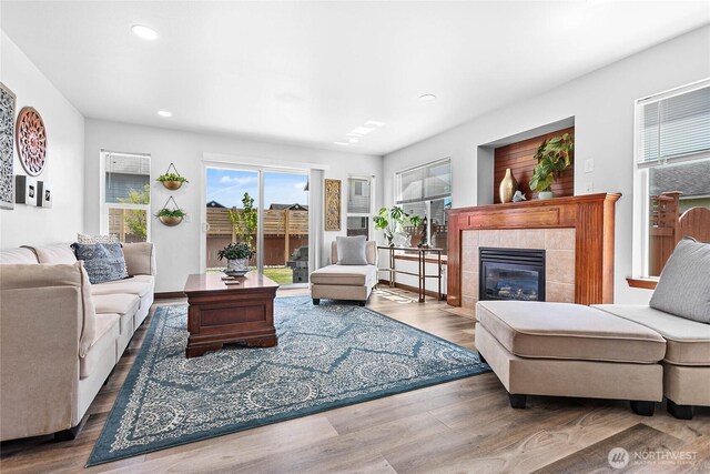 7328 Seashell Way, Blaine, WA 98230 - living area featuring a tile fireplace, recessed lighting, and wood finished floors