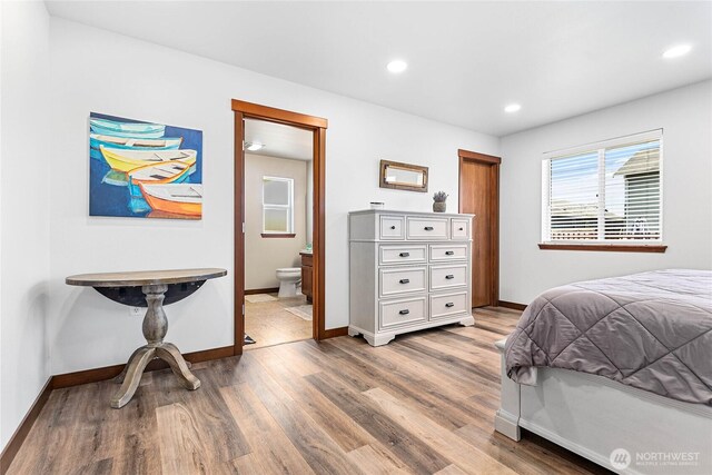 7328 Seashell Way, Blaine, WA 98230 - bedroom with wood finished floors, baseboards, recessed lighting, and ensuite bathroom