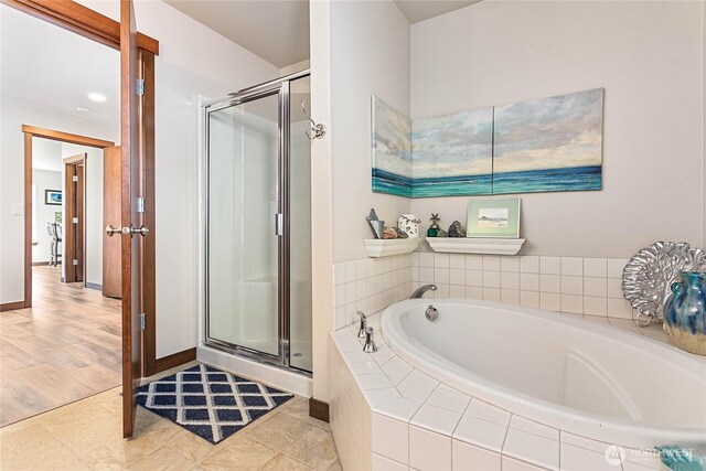 7328 Seashell Way, Blaine, WA 98230 - full bathroom with a stall shower, a garden tub, and baseboards