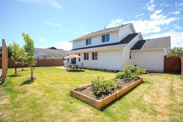 7328 Seashell Way, Blaine, WA 98230 - rear view of property featuring a garden and roof with shingles