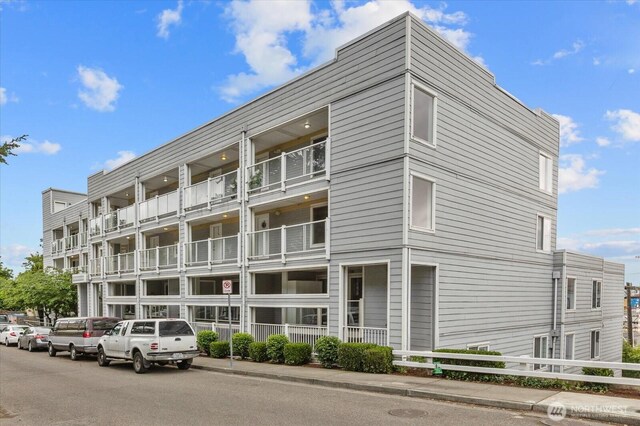 3318 30th Ave SW Unit B402, Seattle, WA 98126 - view of apartment building / complex