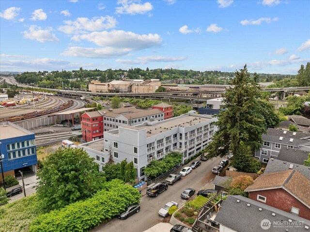 3318 30th Ave SW Unit B402, Seattle, WA 98126 - drone / aerial view of a tree filled landscape