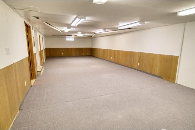 5516 N Fleming St, Spokane, WA 99205 - unfurnished room with wood walls and a wainscoted wall