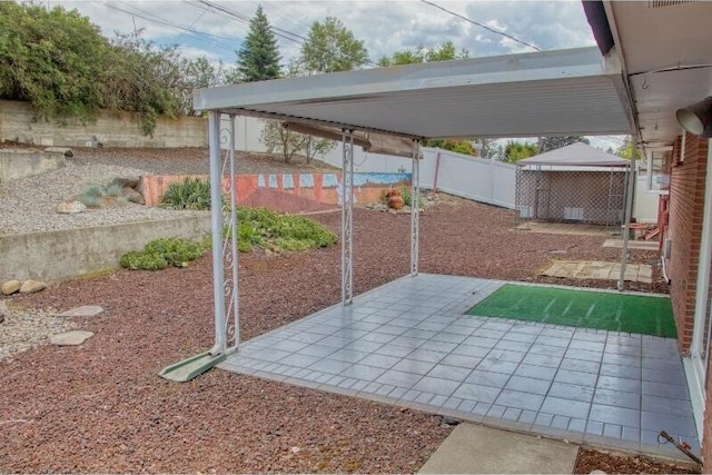 5516 N Fleming St, Spokane, WA 99205 - fenced backyard with a patio area