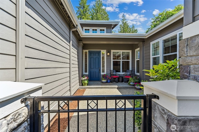 13310 239th Way NE, Redmond, WA 98053 - view of exterior entry with covered porch and a gate