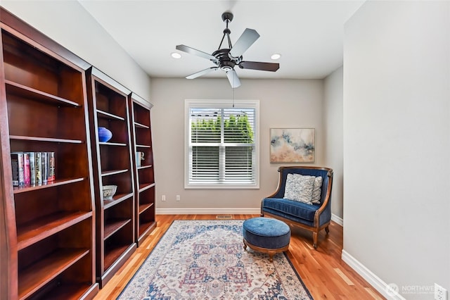13310 239th Way NE, Redmond, WA 98053 - sitting room featuring light wood-style floors, baseboards, and ceiling fan