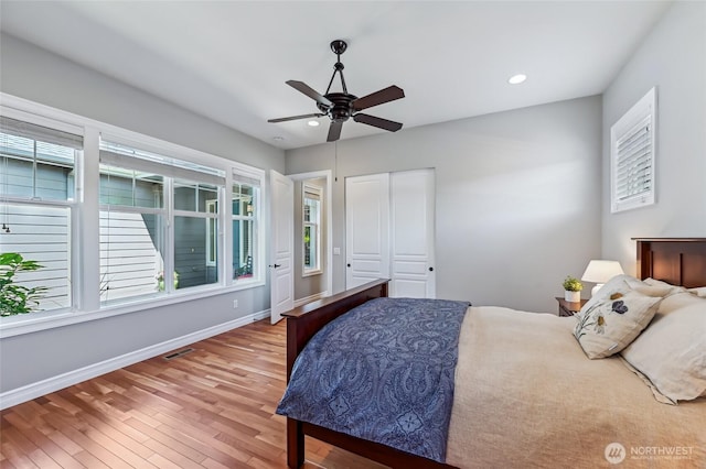 13310 239th Way NE, Redmond, WA 98053 - bedroom featuring light wood-style floors, baseboards, recessed lighting, and a ceiling fan