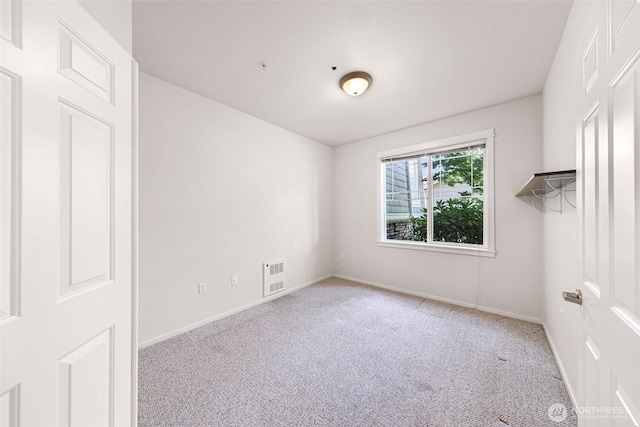 15026 40th Ave W Unit 13-104, Lynnwood, WA 98087 - carpeted empty room featuring baseboards