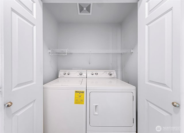 15026 40th Ave W Unit 13-104, Lynnwood, WA 98087 - laundry room featuring washer and clothes dryer