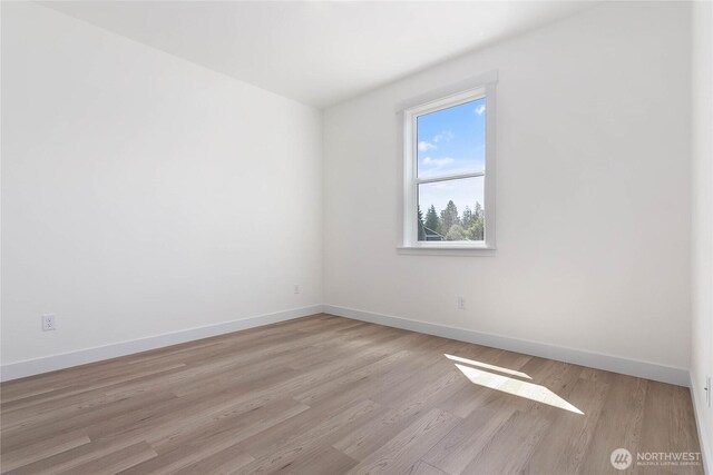120 Sable Dr, Everson, WA 98247 - spare room featuring light wood-style flooring and baseboards