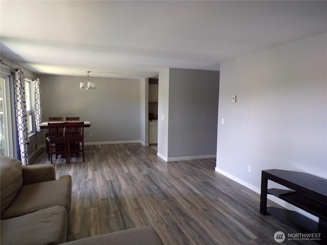2020 SW 318th Pl Unit C3, Federal Way, WA 98023 - living room featuring a chandelier, dark wood finished floors, and baseboards