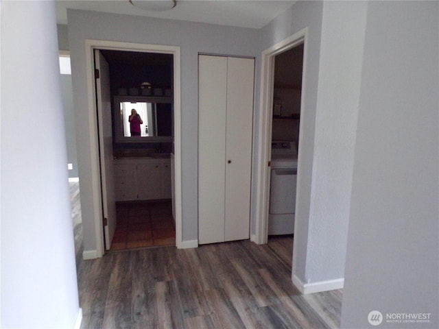 2020 SW 318th Pl Unit C3, Federal Way, WA 98023 - hallway featuring wood finished floors, washer / dryer, and baseboards