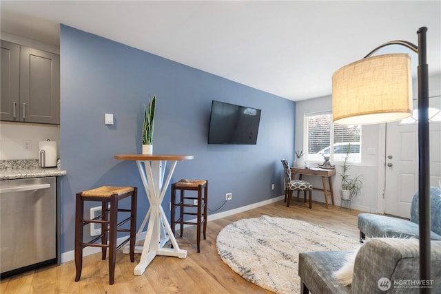 920 S 73rd St, Tacoma, WA 98408 - living room featuring light wood-style floors and baseboards