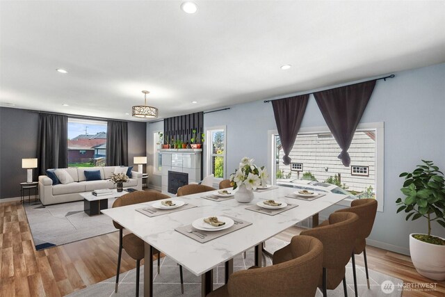 212 N Michigan St, Aberdeen, WA 98520 - dining area with light wood-style floors, recessed lighting, and baseboards