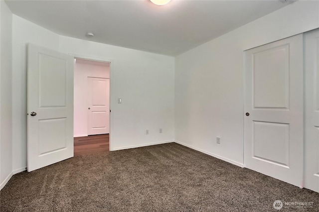 250 Hewitt Rd Unit 23, Chehalis, WA 98532 - empty room featuring dark carpet and baseboards
