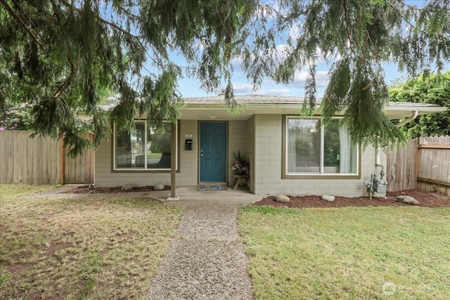 1412 Mcmillan Ave, Sumner, WA 98390 - view of front facade featuring concrete block siding