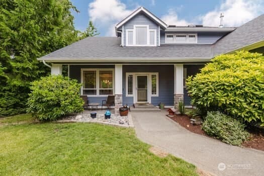 1155 Woods Rd SE, Port Orchard, WA 98366 - view of front of home with a porch and a front yard
