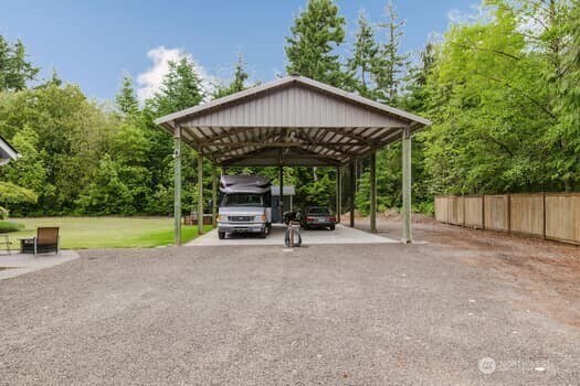 1155 Woods Rd SE, Port Orchard, WA 98366 - view of vehicle parking featuring a carport