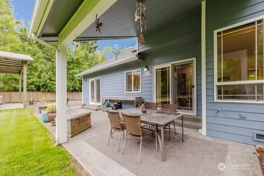 1155 Woods Rd SE, Port Orchard, WA 98366 - view of patio featuring outdoor dining space