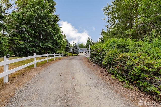 1155 Woods Rd SE, Port Orchard, WA 98366 - view of dirt / gravel road featuring a gated entry
