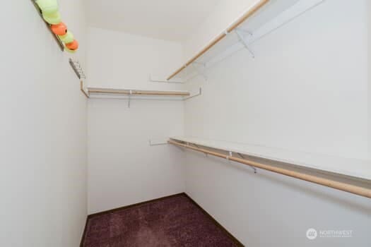 1155 Woods Rd SE, Port Orchard, WA 98366 - walk in closet with dark carpet