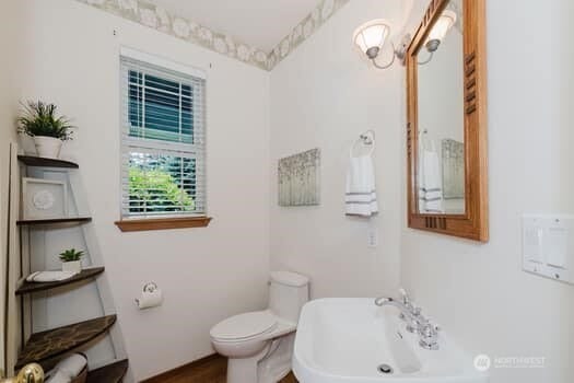 1155 Woods Rd SE, Port Orchard, WA 98366 - bathroom featuring toilet and wood finished floors