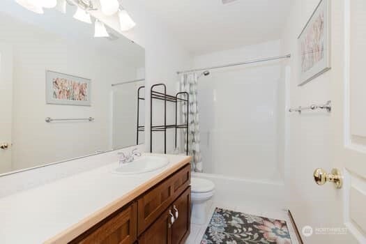1155 Woods Rd SE, Port Orchard, WA 98366 - bathroom featuring vanity and shower / tub combination
