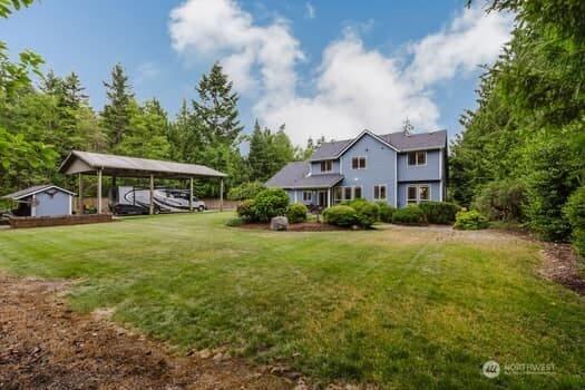 1155 Woods Rd SE, Port Orchard, WA 98366 - view of grassy yard with a detached carport