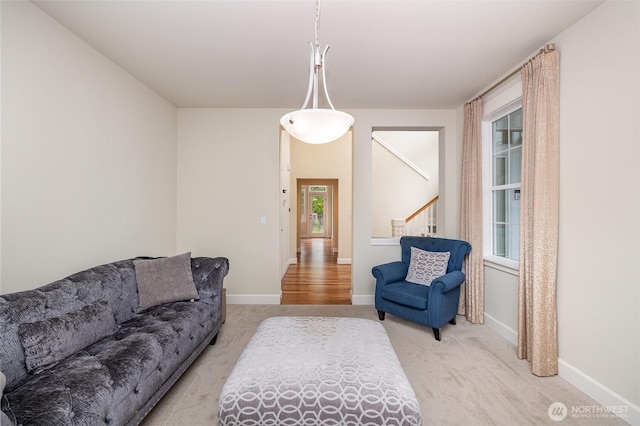 17376 NE 119th Way, Redmond, WA 98052 - living area with carpet, stairway, and baseboards
