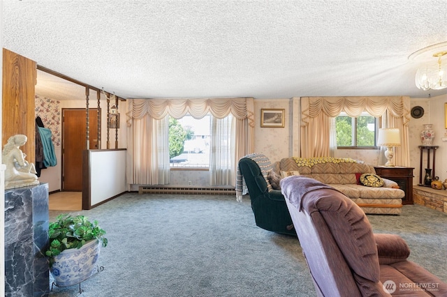 515 N Clark Rd, Moses Lake, WA 98837 - living area with carpet, a textured ceiling, wallpapered walls, a chandelier, and a baseboard radiator