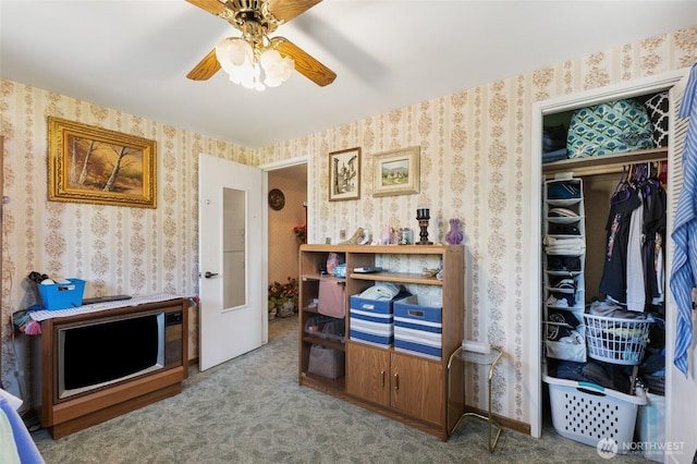 515 N Clark Rd, Moses Lake, WA 98837 - bedroom with carpet, wallpapered walls, a closet, and a ceiling fan
