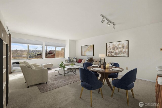 1964 26th Ave W Unit 102, Seattle, WA 98199 - dining space featuring light carpet and rail lighting