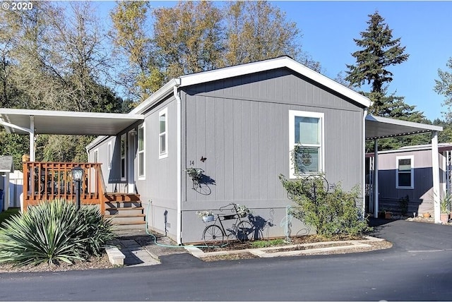 1693 N Sheperd Rd Unit 14, Washougal, WA 98671 - view of side of home featuring an attached carport